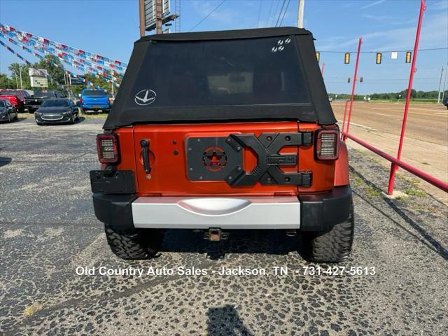 used 2014 Jeep Wrangler Unlimited car, priced at $12,988