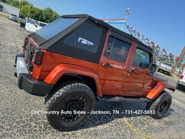 used 2014 Jeep Wrangler Unlimited car, priced at $12,988