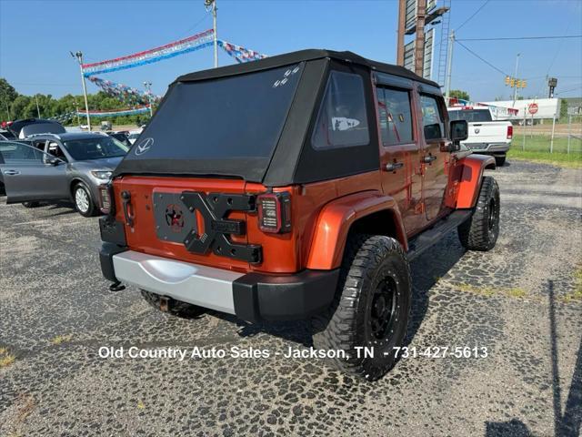 used 2014 Jeep Wrangler Unlimited car, priced at $12,988