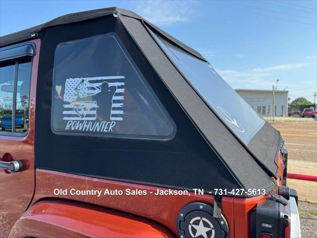 used 2014 Jeep Wrangler Unlimited car, priced at $12,988