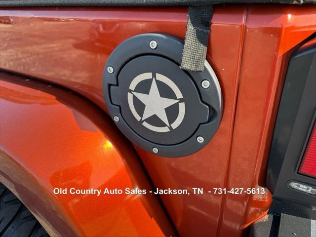 used 2014 Jeep Wrangler Unlimited car, priced at $12,988