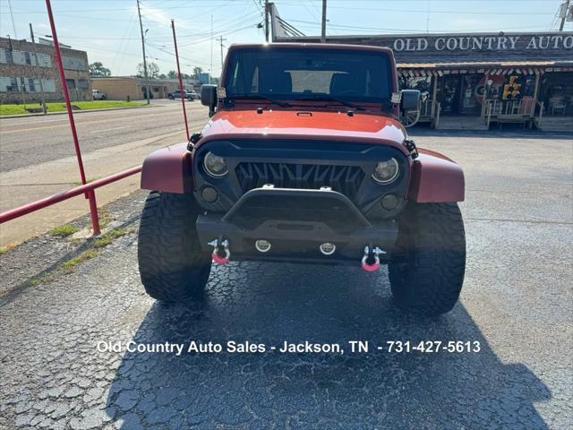 used 2014 Jeep Wrangler Unlimited car, priced at $12,988