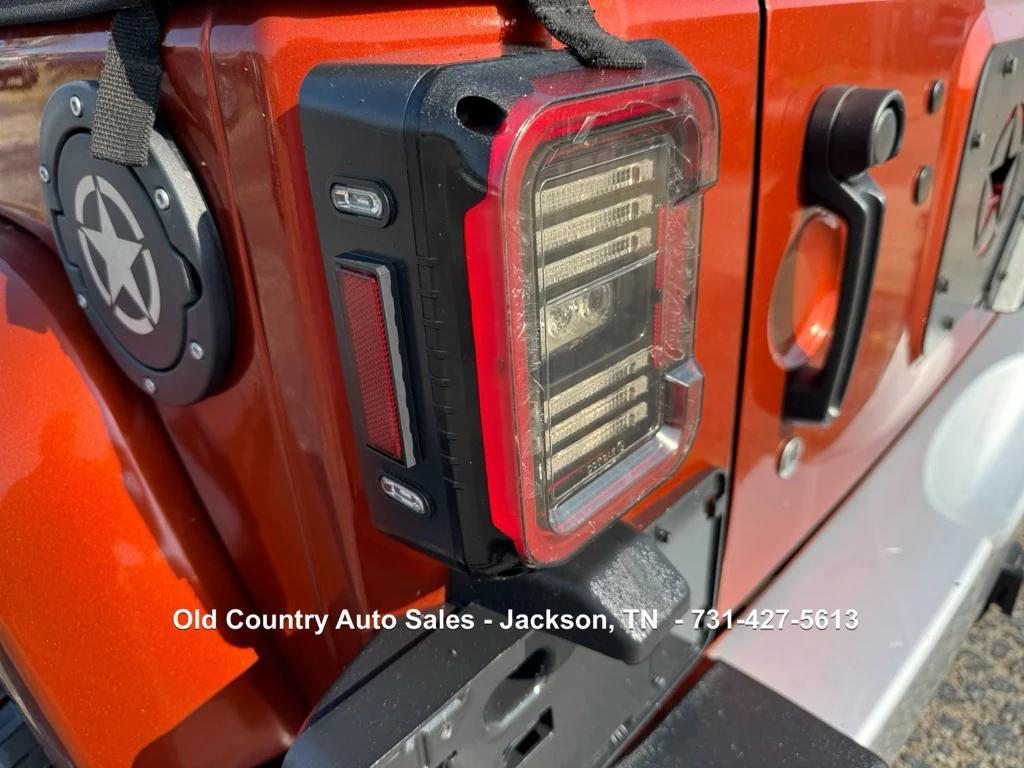 used 2014 Jeep Wrangler Unlimited car, priced at $12,988