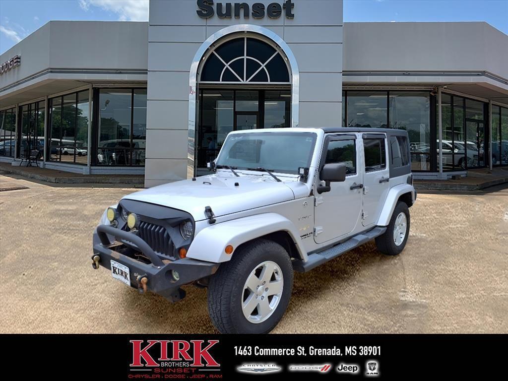 used 2012 Jeep Wrangler Unlimited car, priced at $13,900