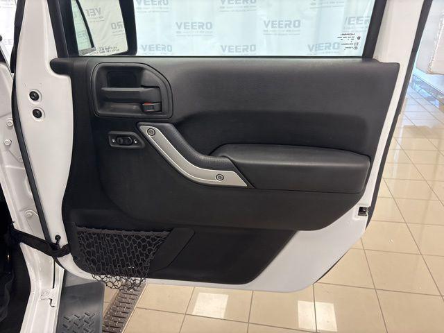 used 2015 Jeep Wrangler Unlimited car, priced at $13,994