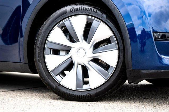 used 2023 Tesla Model Y car, priced at $32,670