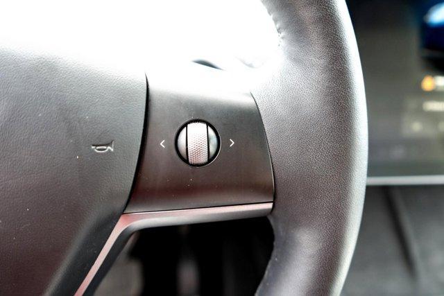 used 2023 Tesla Model Y car, priced at $32,670