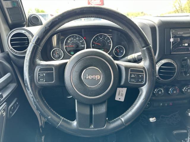 used 2013 Jeep Wrangler Unlimited car, priced at $16,968