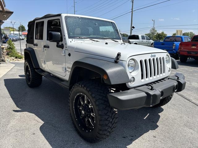 used 2014 Jeep Wrangler Unlimited car, priced at $19,701