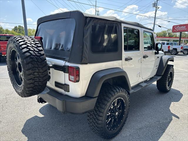 used 2014 Jeep Wrangler Unlimited car, priced at $19,701