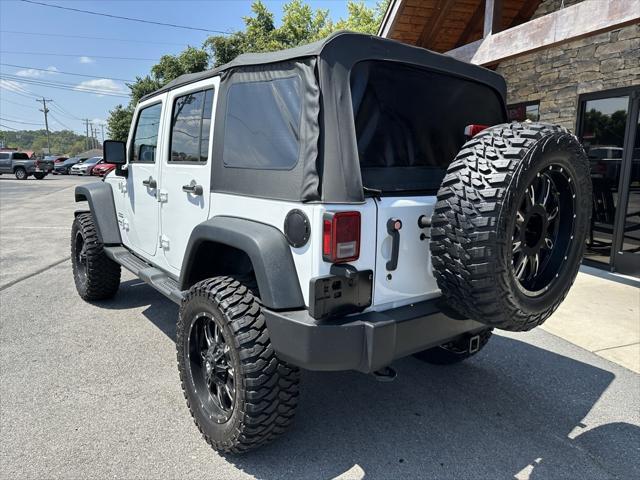 used 2014 Jeep Wrangler Unlimited car, priced at $19,701