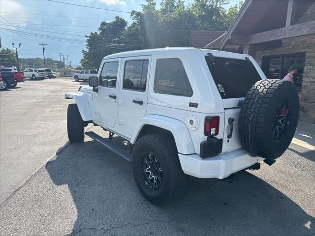 used 2015 Jeep Wrangler Unlimited car, priced at $14,600