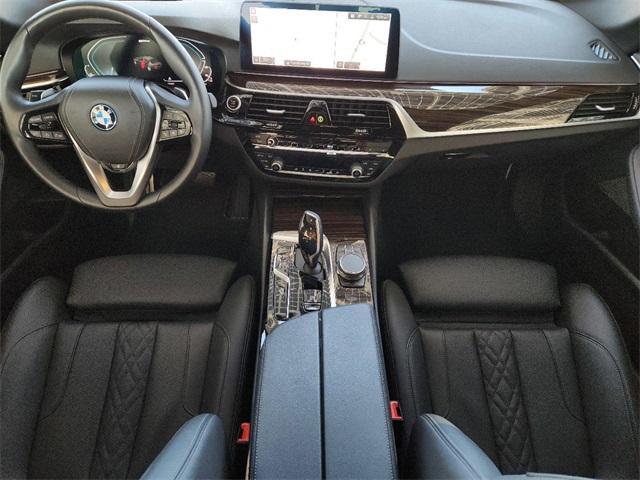 used 2023 BMW 530e car, priced at $35,298