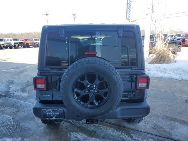 used 2021 Jeep Wrangler car, priced at $27,986