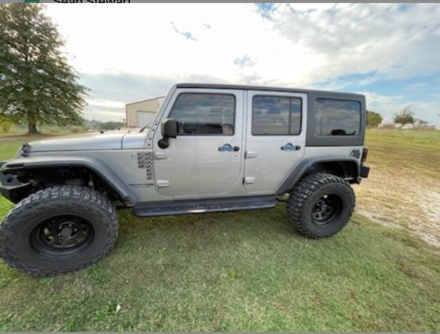 used 2018 Jeep Wrangler JK Unlimited car, priced at $18,710