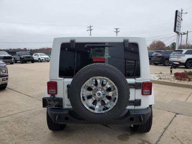 used 2016 Jeep Wrangler Unlimited car, priced at $23,515