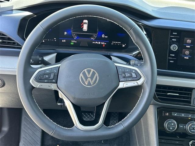 new 2024 Volkswagen Taos car, priced at $26,843
