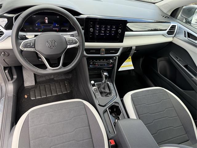 new 2025 Volkswagen Taos car, priced at $28,999