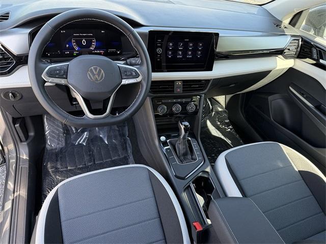 new 2025 Volkswagen Taos car, priced at $25,999