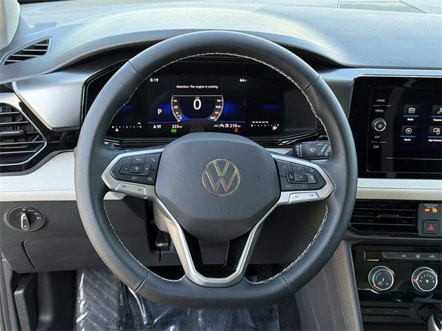 new 2025 Volkswagen Taos car, priced at $25,999