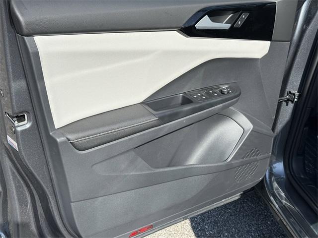 new 2025 Volkswagen Taos car, priced at $25,999