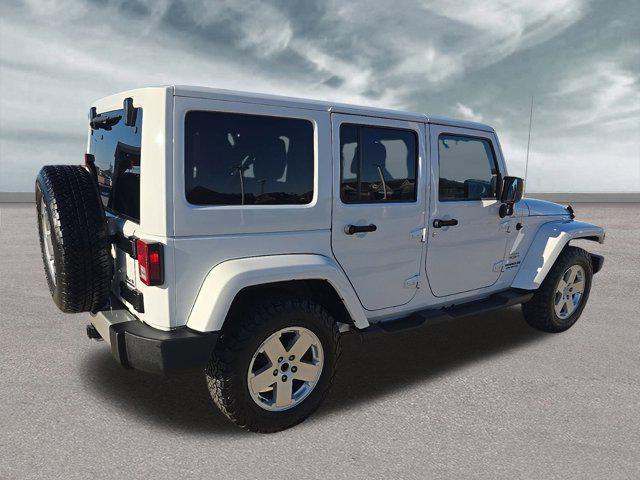 used 2011 Jeep Wrangler Unlimited car, priced at $12,999