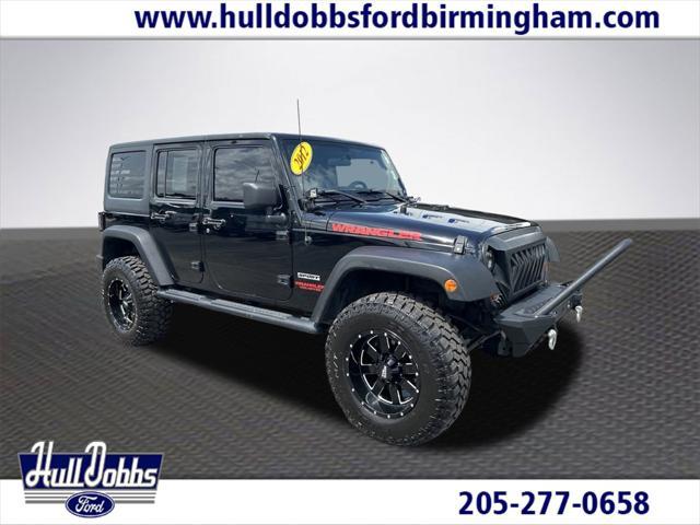 used 2012 Jeep Wrangler Unlimited car, priced at $18,909