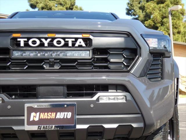 used 2024 Toyota Tacoma car, priced at $47,990