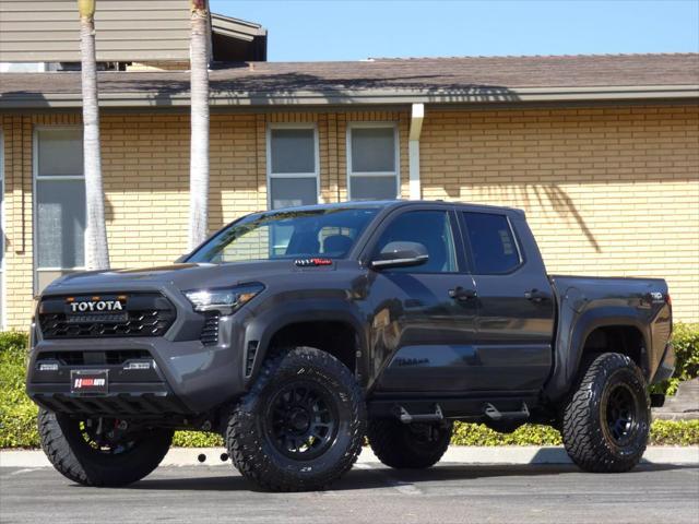 used 2024 Toyota Tacoma car, priced at $47,990