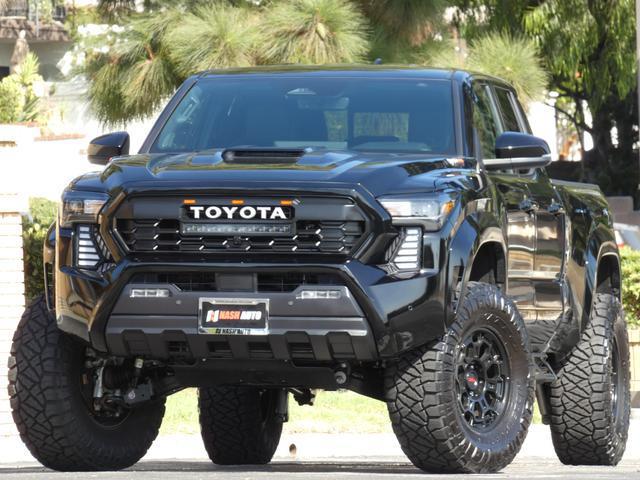 used 2024 Toyota Tacoma car, priced at $51,990