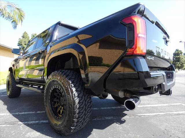 used 2025 Toyota Tacoma car, priced at $48,990