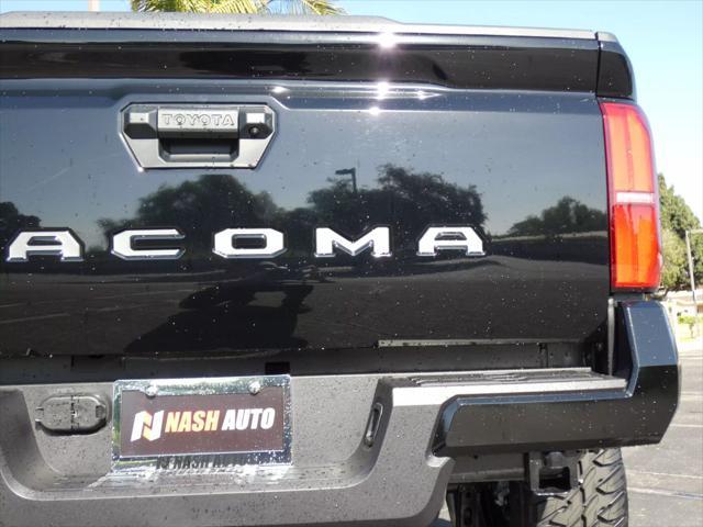 used 2025 Toyota Tacoma car, priced at $48,990