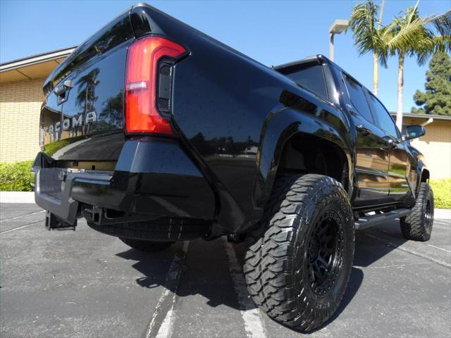 used 2025 Toyota Tacoma car, priced at $48,990