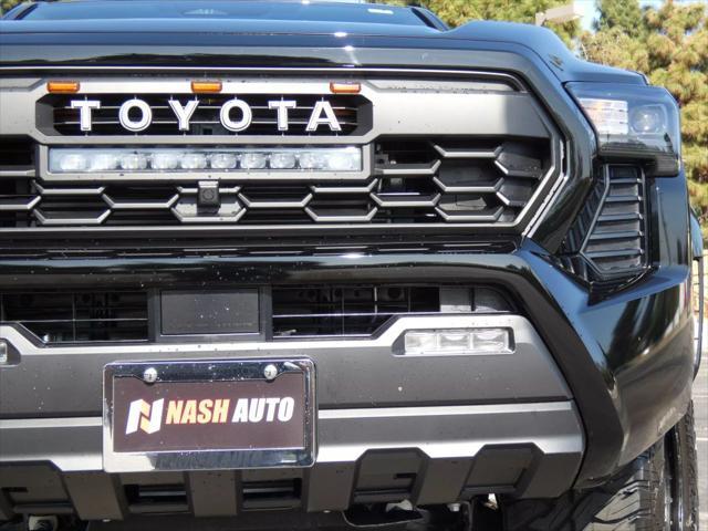 used 2025 Toyota Tacoma car, priced at $48,990