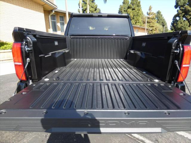 used 2025 Toyota Tacoma car, priced at $48,990