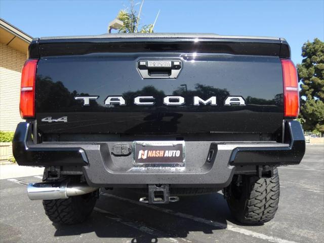 used 2025 Toyota Tacoma car, priced at $48,990