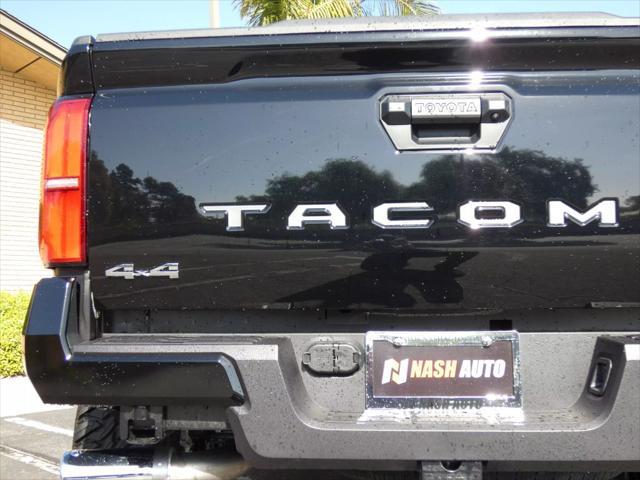 used 2025 Toyota Tacoma car, priced at $48,990