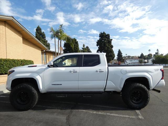 used 2024 Toyota Tacoma car, priced at $48,990