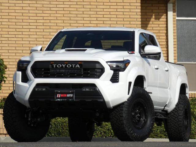 used 2024 Toyota Tacoma car, priced at $48,990