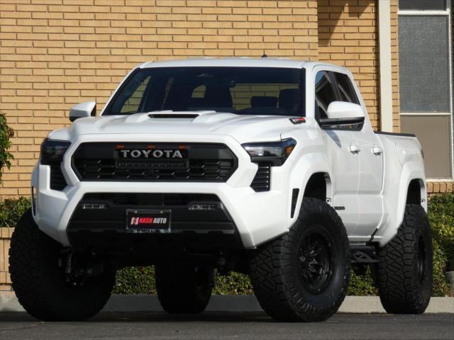 used 2024 Toyota Tacoma car, priced at $48,990