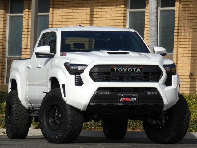 used 2024 Toyota Tacoma car, priced at $48,990