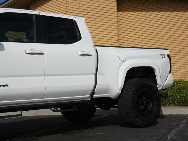 used 2024 Toyota Tacoma car, priced at $48,990