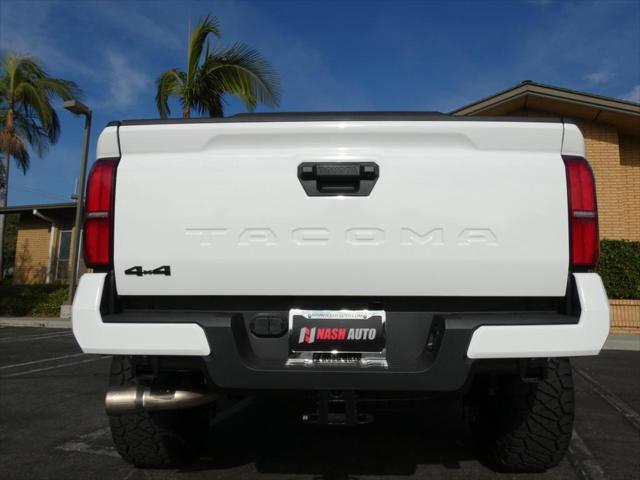 used 2024 Toyota Tacoma car, priced at $48,990