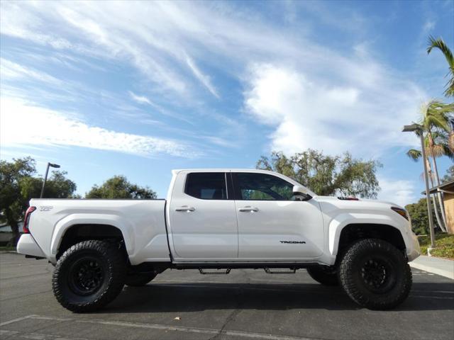 used 2024 Toyota Tacoma car, priced at $48,990