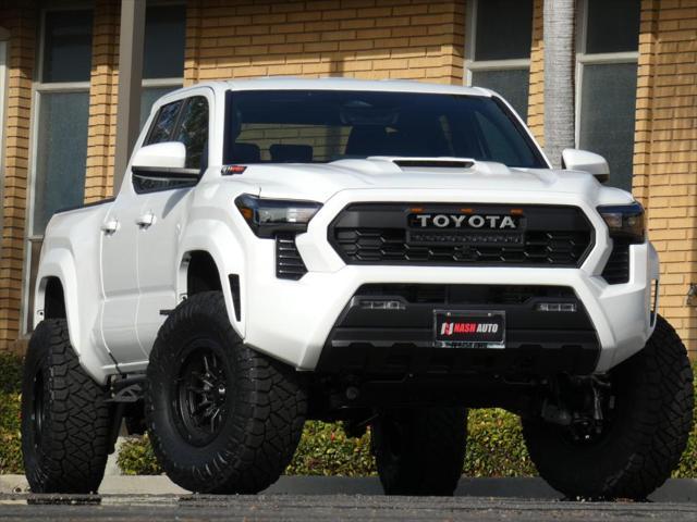 used 2024 Toyota Tacoma car, priced at $48,990