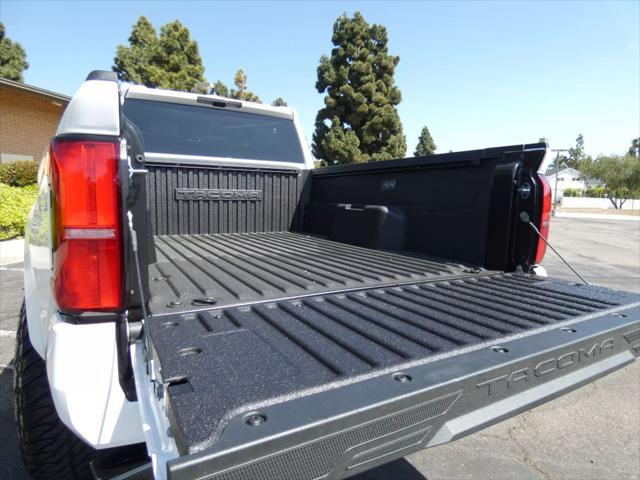 used 2025 Toyota Tacoma car, priced at $50,990