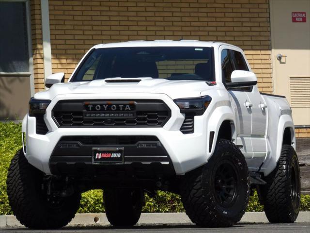 used 2025 Toyota Tacoma car, priced at $50,990