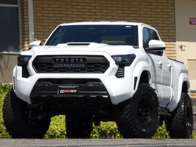used 2025 Toyota Tacoma car, priced at $50,990