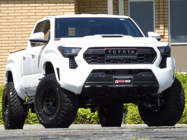 used 2025 Toyota Tacoma car, priced at $50,990