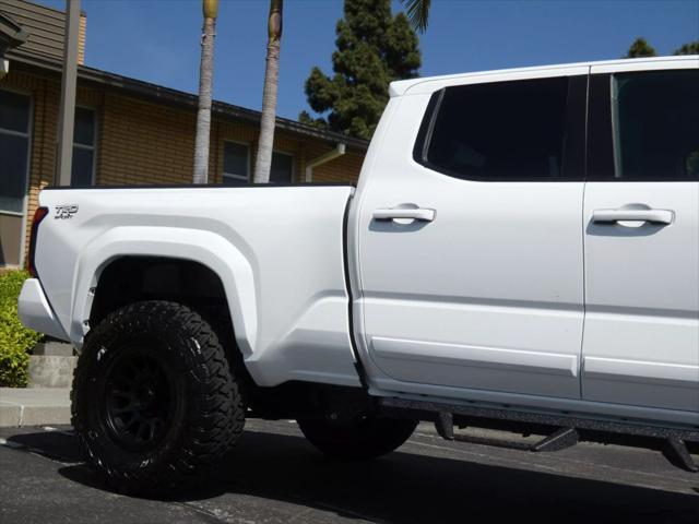 used 2025 Toyota Tacoma car, priced at $50,990